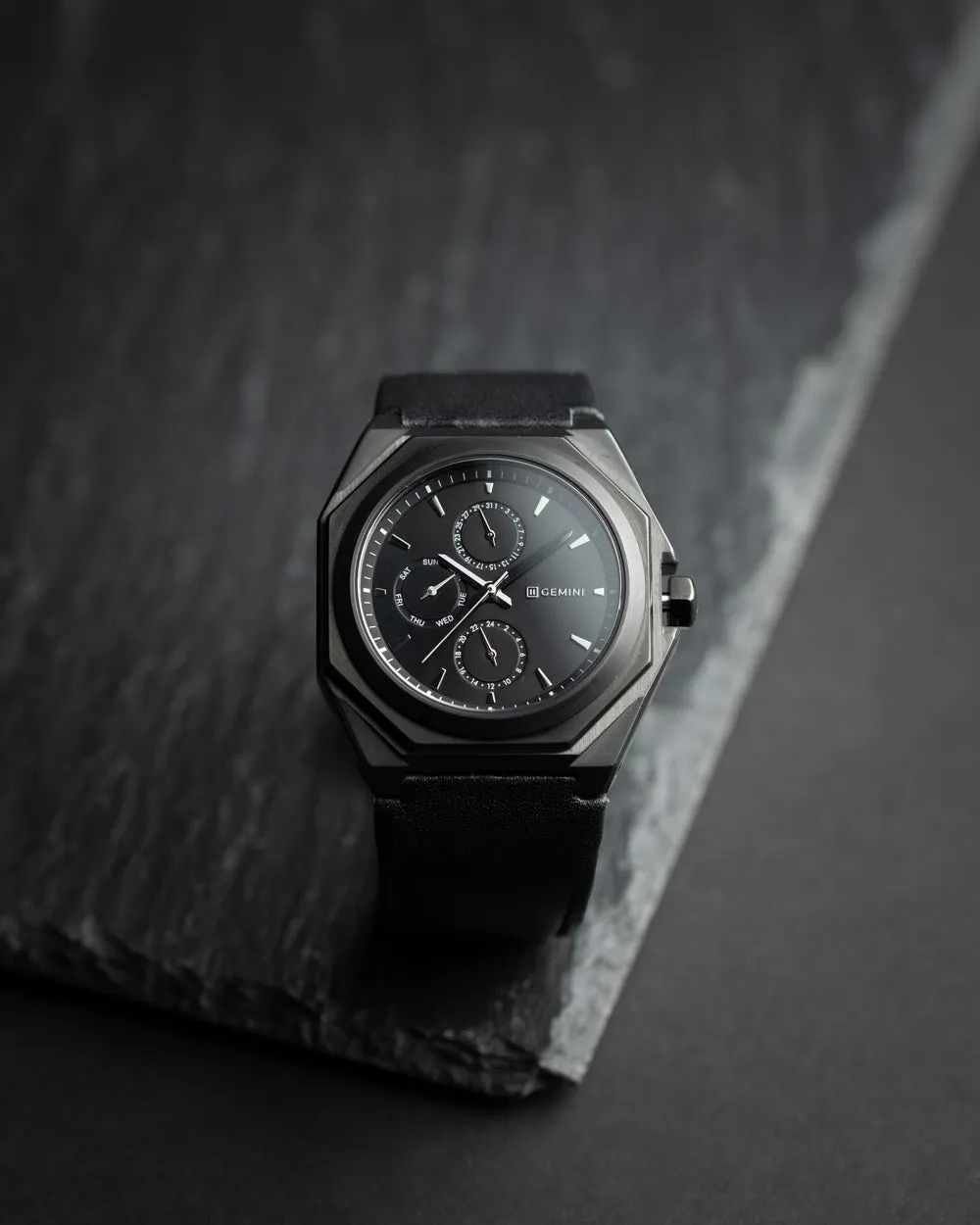 42mm black steel watch with Italian leather strap