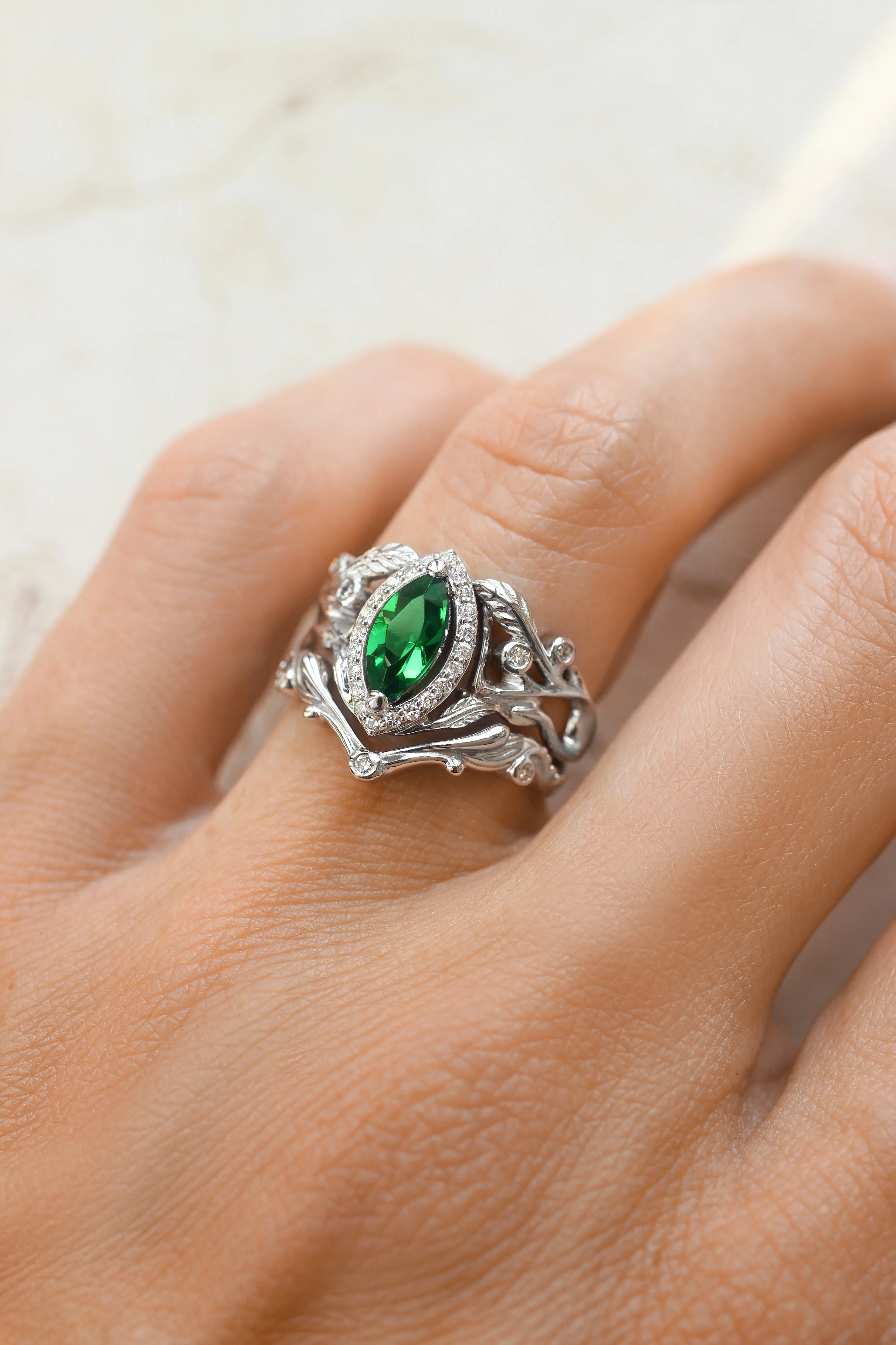 Bridal ring set with lab emerald and diamond halo / Callisto